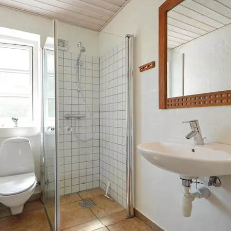 Praestekraven Feriehus Romo